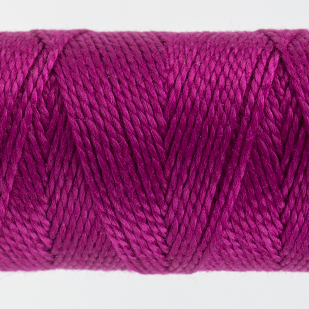 closeup of fuchsia perle cotton thread