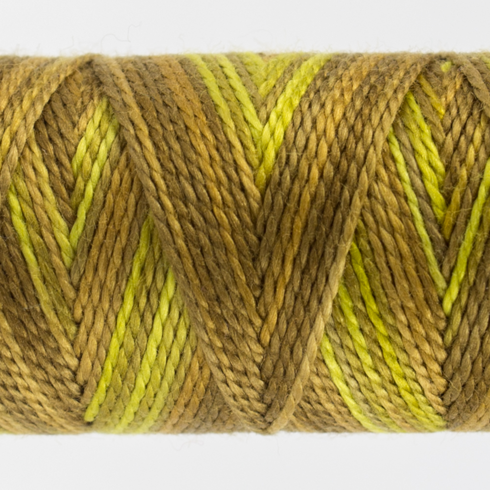 closeup of variegated perle cotton thread gold colours