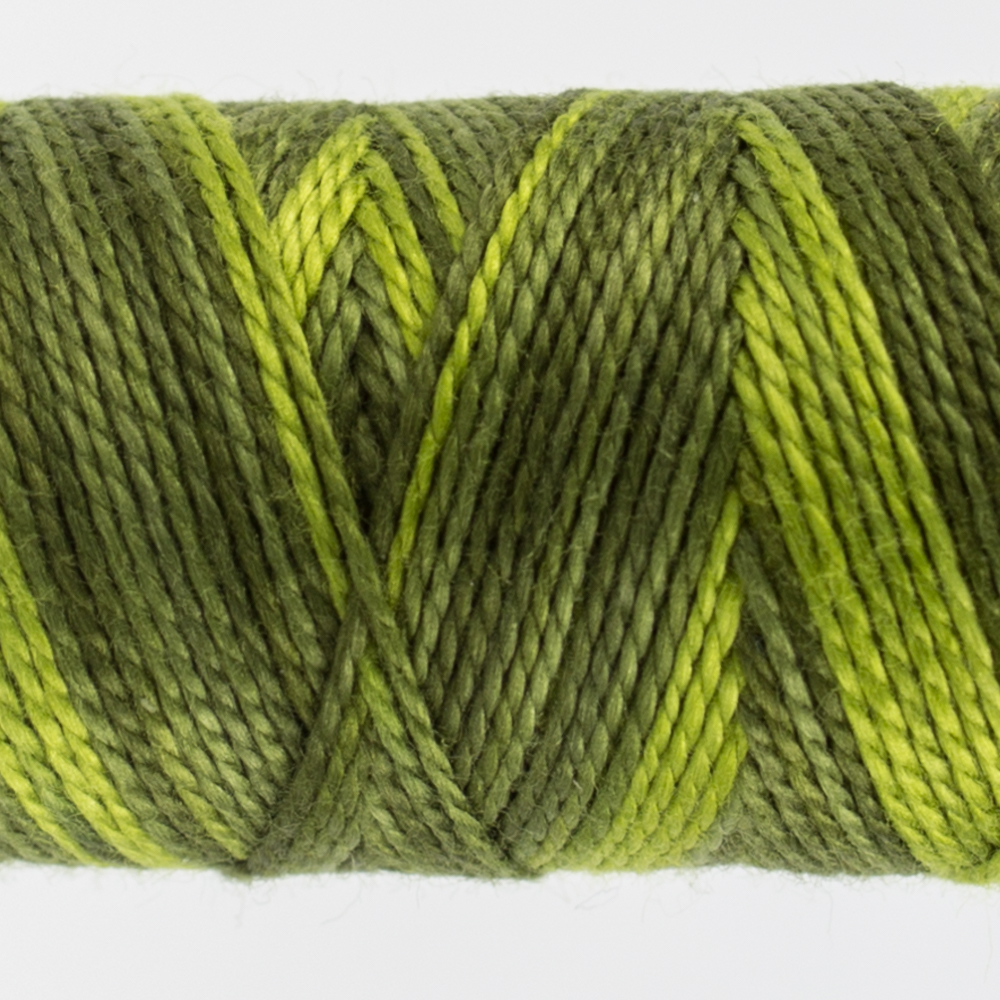 closeup of variegated perle cotton thread tree green colours
