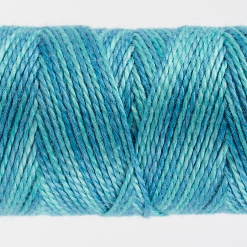 closeup of variegated perle cotton thread aqua blue colours