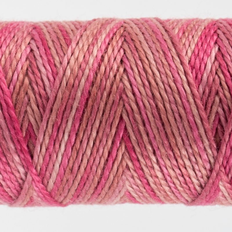 closeup of variegated perle cotton thread dusty pink colours