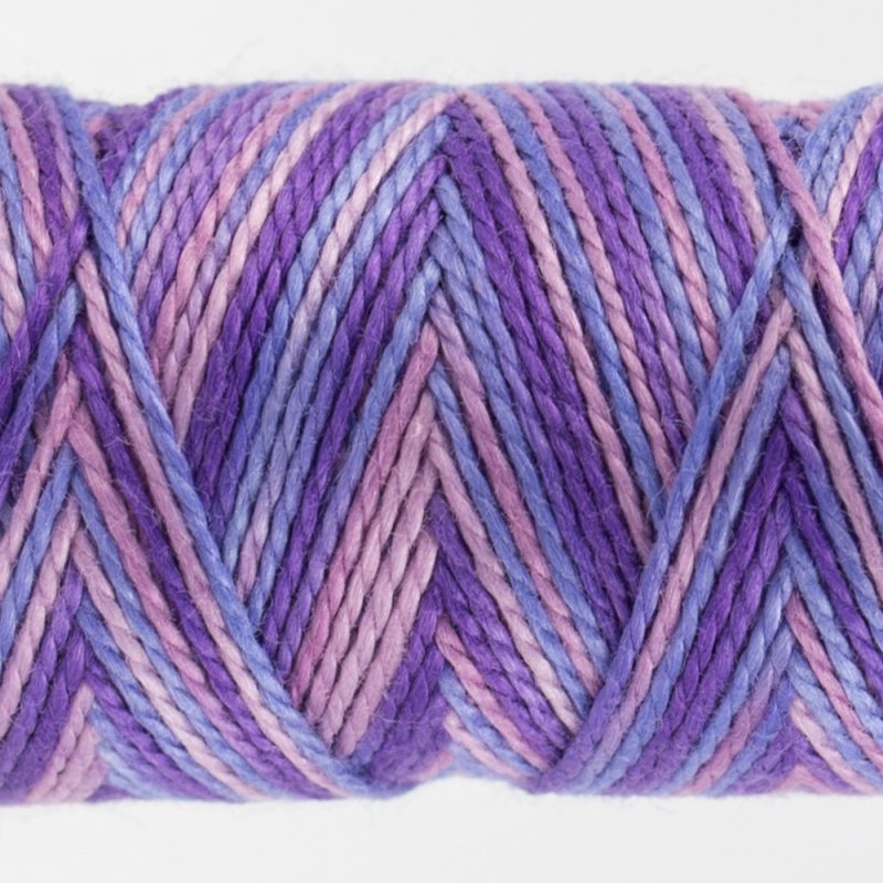 closeup of variegated perle cotton thread lilac colours