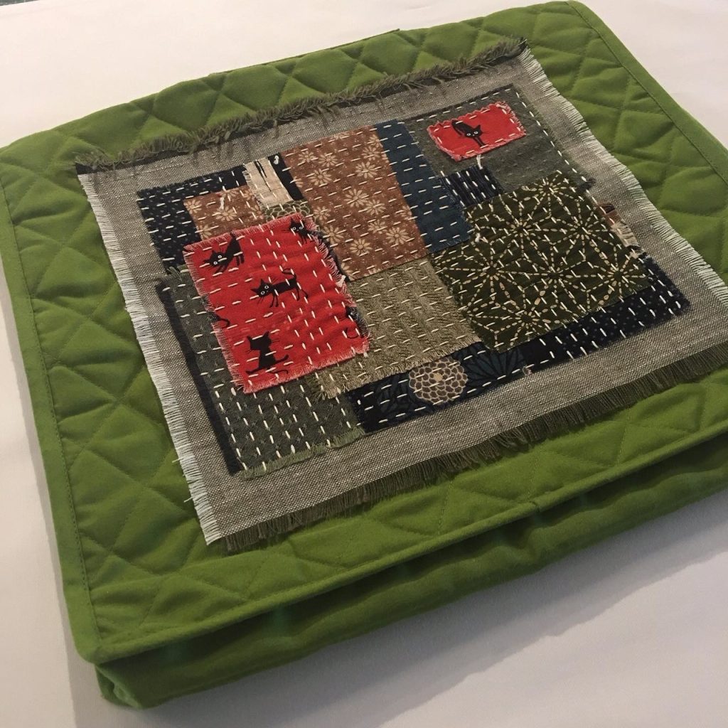 green craft folder with boro decoration